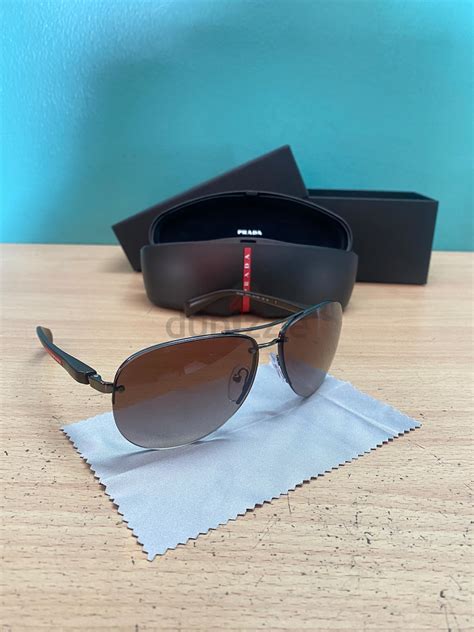 prada tan sunglasses|Prada unisex sunglasses.